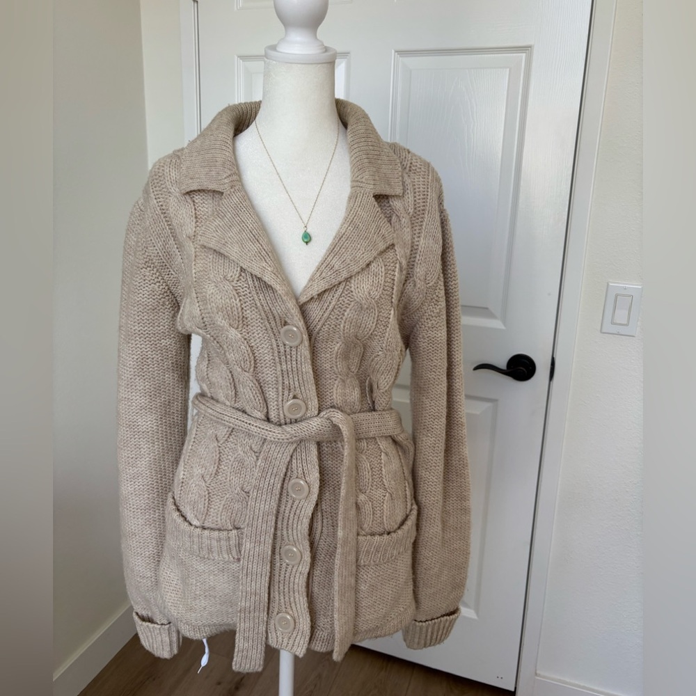 Vintage wool cardigan sweater with belt. Fits a size M woman. Bought in LA.